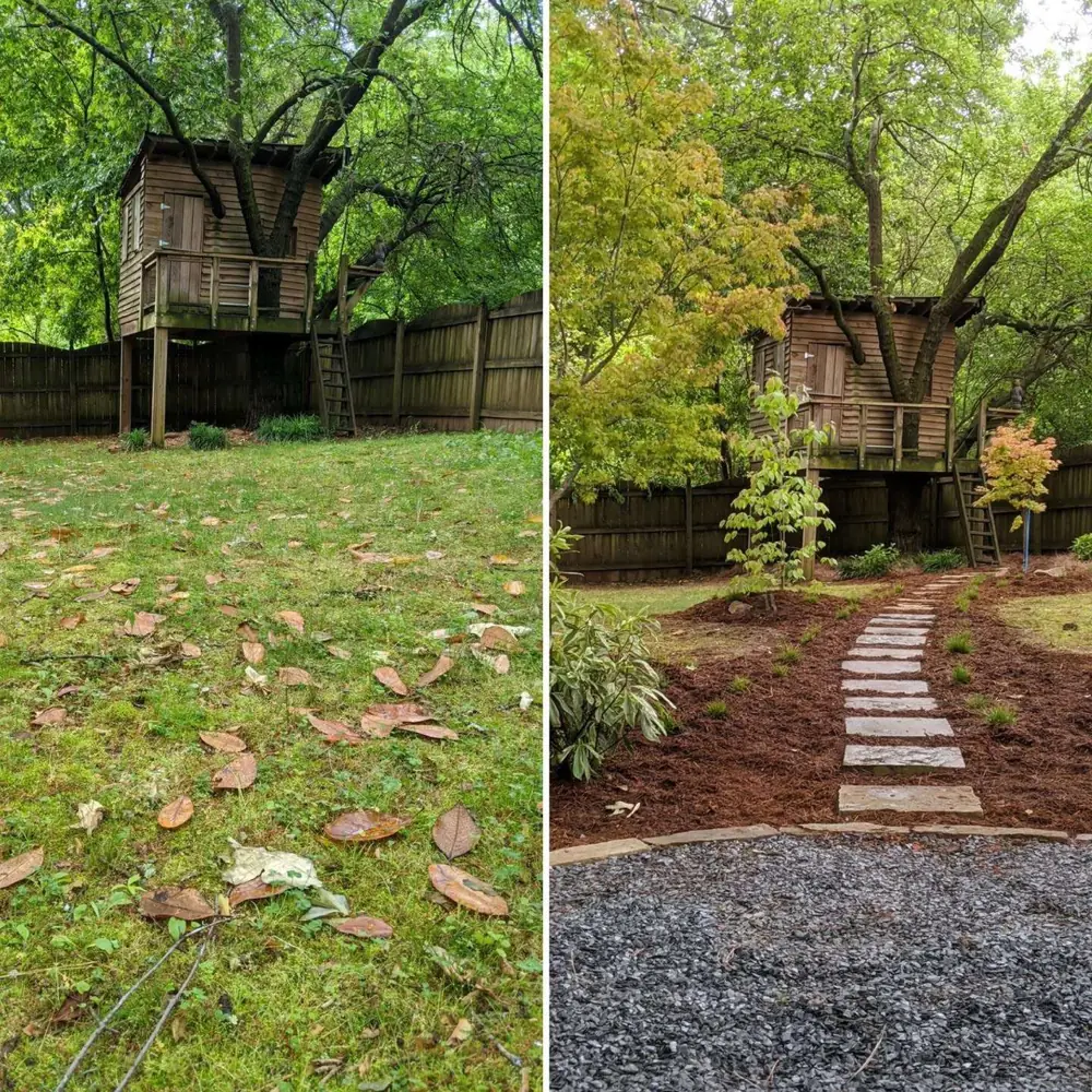 Backyard with stepping stone path along a fence